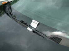 Picture of a vehicle with a ticket attached